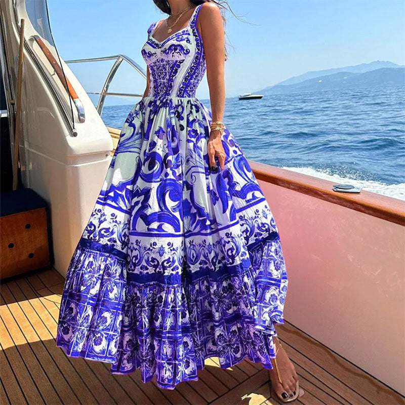 Elegant mid-length large-swing printed halter dress